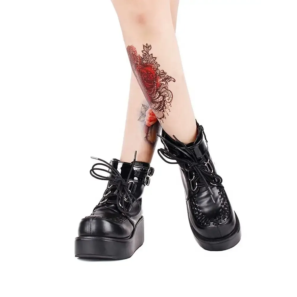 Black Platform Creeper Boots with Lace-Up Design and Textured Sole