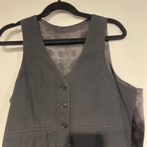black vest