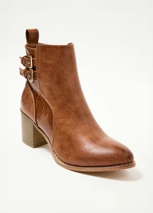 Boots with heels and reptile effect insert
