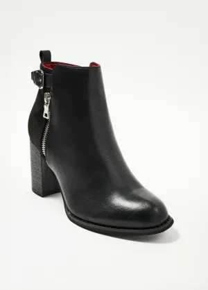 High heeled bi-material boots with buckle and zip