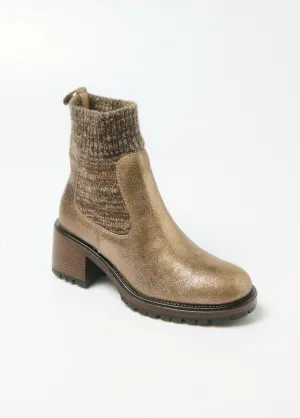 Metallic boots with sock upper heel