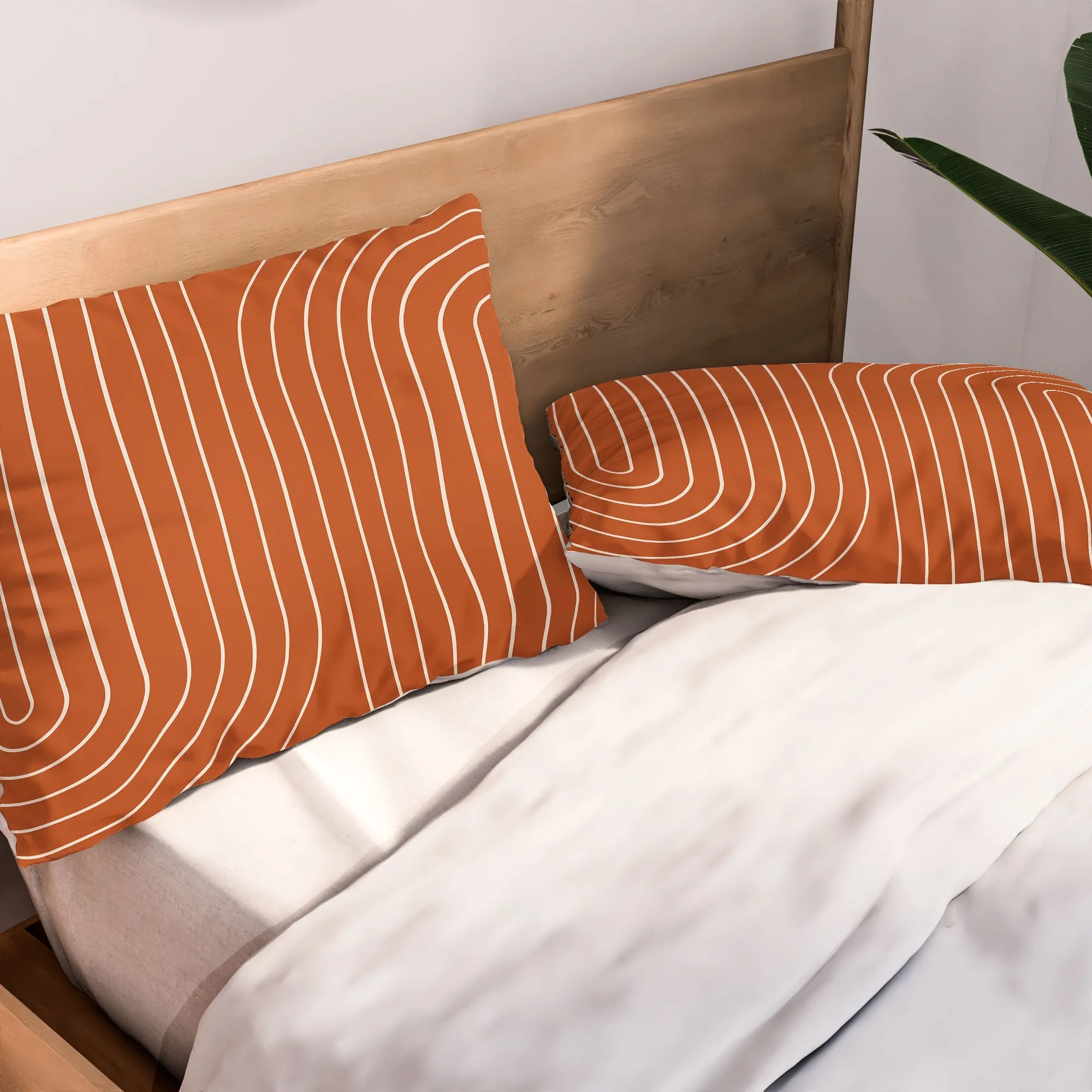 MINIMAL LINE CURVATURE CORAL PILLOW SHAMS