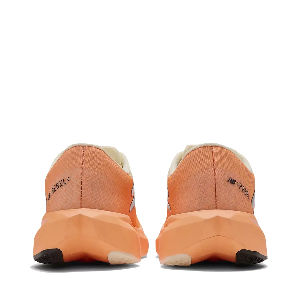 New Balance Women's FuelCell Rebel v4 Sneaker in Hot Mango/Angora/Black